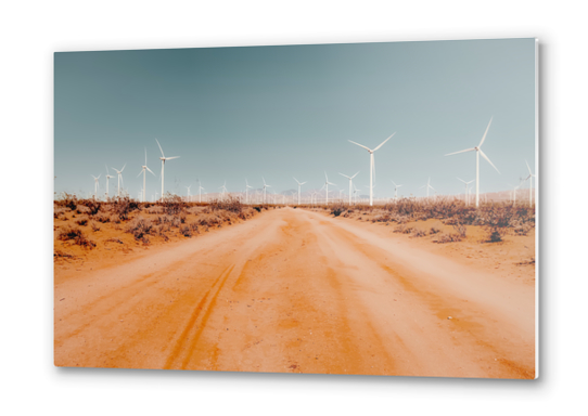 Wind turbine in the desert with sandy road at Kern County California USA Metal prints by Timmy333