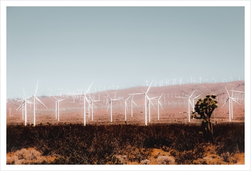 Wind turbine in the desert with blue sky at Kern County California USA Art Print by Timmy333