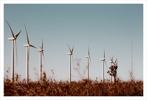 Wind turbine in the desert with blue sky at Kern County California USA Art Print by Timmy333