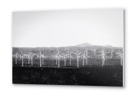 wind turbine in the desert with mountain background in black and white Metal prints by Timmy333