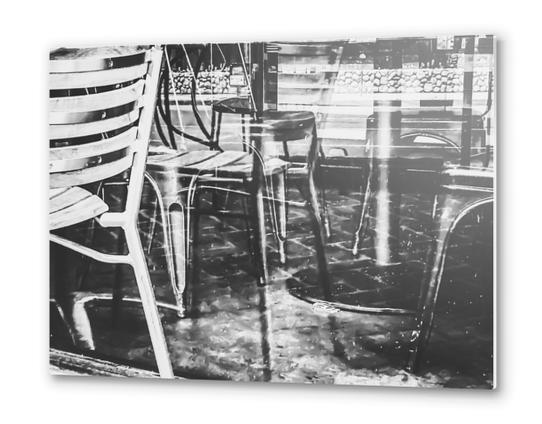 outdoor chairs in the city in black and white Metal prints by Timmy333