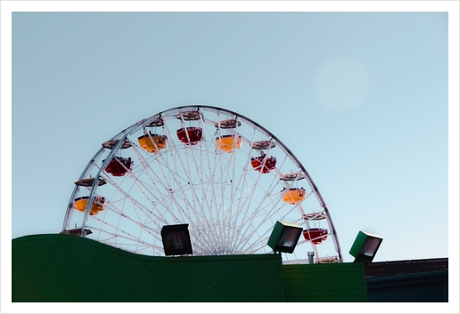 colorful ferris wheel at Santa Monica pier California USA with blue sky Art Print by Timmy333