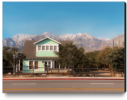 blue house with mountain view background in California USA Canvas Print by Timmy333