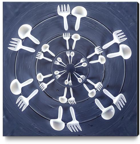 forks and spoons on the wooden table in circle pattern Canvas Print by Timmy333