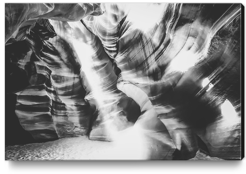 rock in the cave with sunlight at Antelope Canyon, USA in black and white Canvas Print by Timmy333