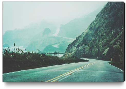 road on the mountain with fog at Highway 1, California, USA in winter Canvas Print by Timmy333