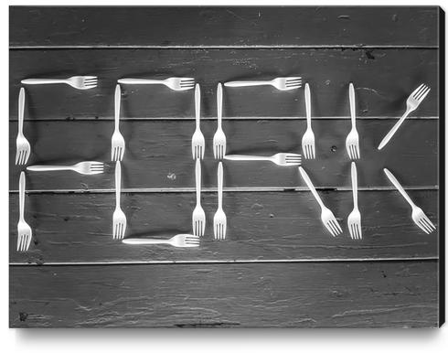 FORK alphabet made with plastic forks on the wooden table in black and white Canvas Print by Timmy333