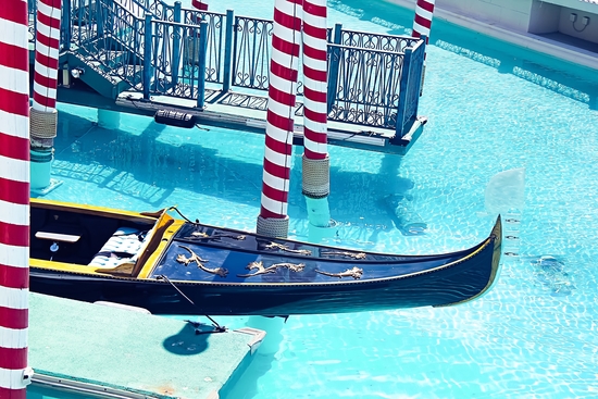 Classic Gondola boat and blue water by Timmy333