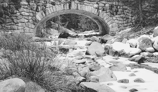 river covered with snow at Sequoia national park, USA in black and white by Timmy333