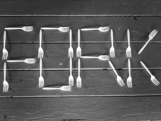 FORK alphabet made with plastic forks on the wooden table in black and white by Timmy333